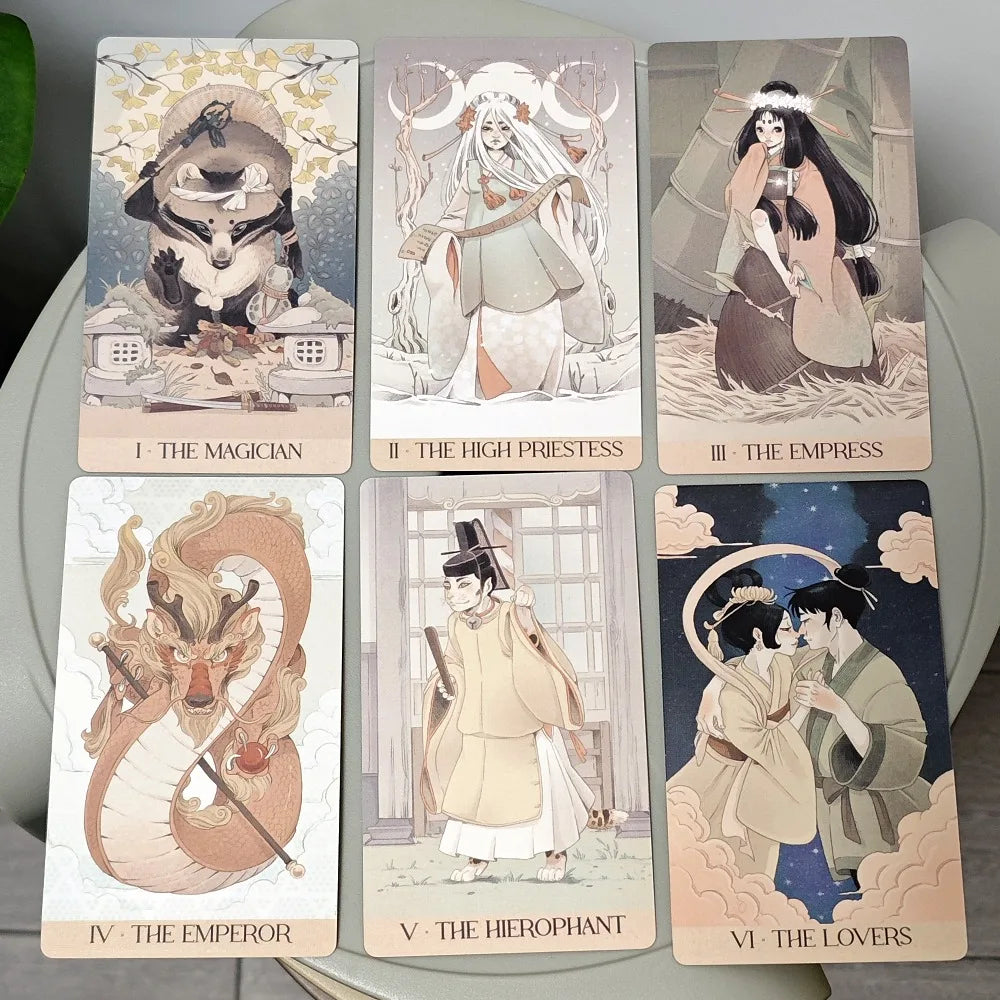 Yōkai Tarot box front featuring a kitsune fox spirit mask illustration by Marga Biazzi and Paolo Bertazzo