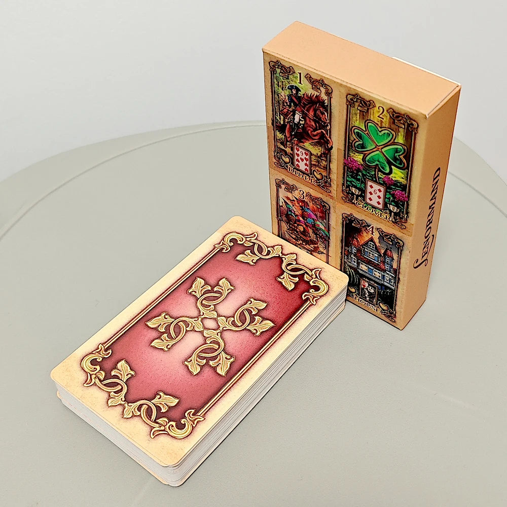 Lustrous Lenormand — six holographic cards: 43 Labyrinth (golden light on stone maze), 42 Masks (jester with comedy and tragedy masks), 41 Bridge (sunset swan lake iron bridge), 40 Compass (brass compass on map), 39 Dice (hand rolling red star dice), 38 Well (stone wishing well at dusk)