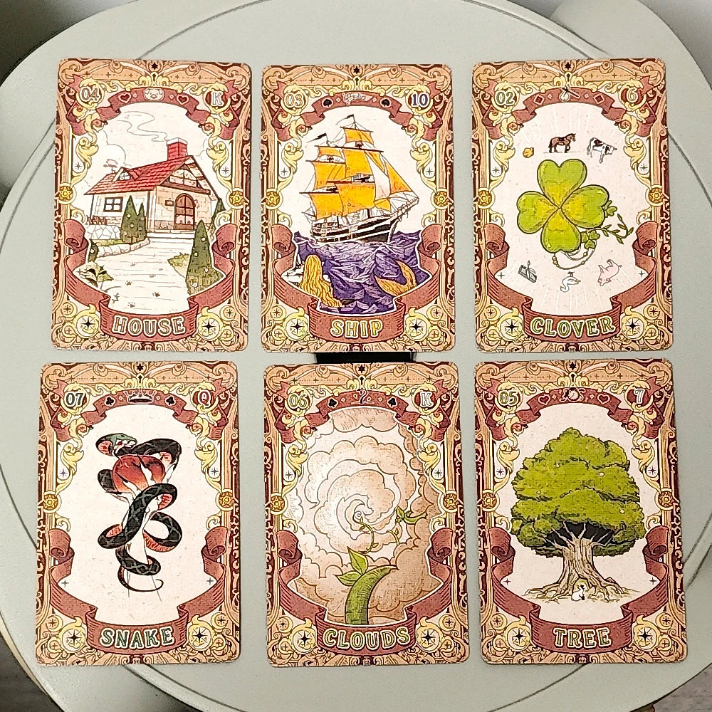 Fairy Tale Dream Lenormand — six face-up cards: House, Ship, Clover, Snake, Clouds, Tree with fairy tale inspired illustrations