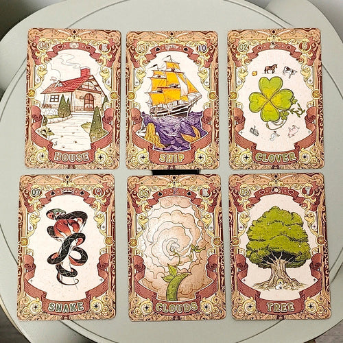Fairy Tale Dream Lenormand — six face-up cards: House, Ship, Clover, Snake, Clouds, Tree with fairy tale inspired illustrations