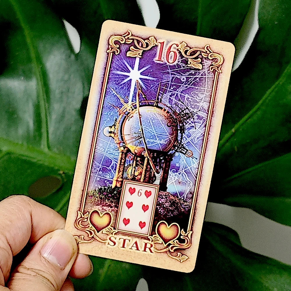 Lustrous Lenormand — deck face-up showing card 13 Child (sleeping Victorian girl with teddy bear in pink silk) beside illustrated peach tuck box featuring a seated Victorian lady in blue skirt in garden; title reads Lustrous Lenormand
