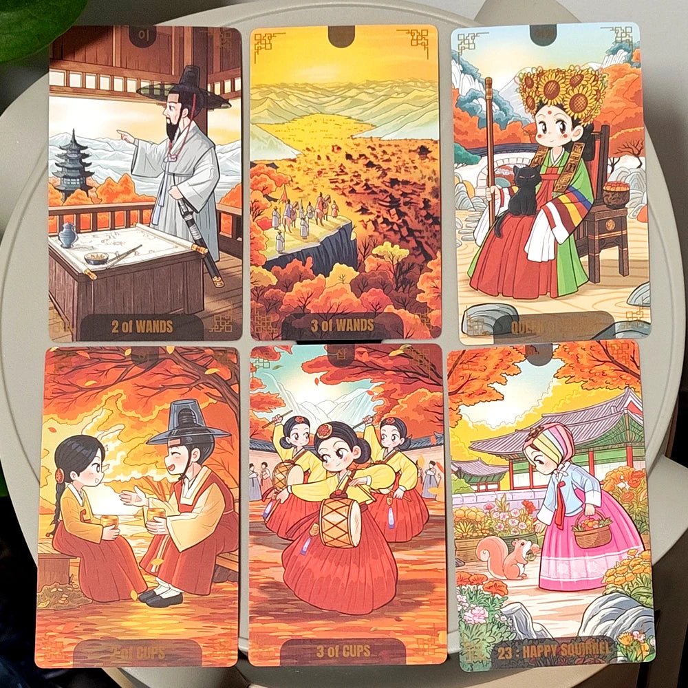 Korenji Tarot face-up cards: 2 of Wands, 3 of Wands, Queen of Wands, 2 of Cups, 3 of Cups, and No.23 Happy Squirrel