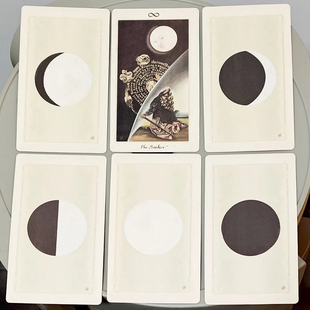 Pagan Otherworlds Tarot — six card backs showing intricate dark floral geometric pattern