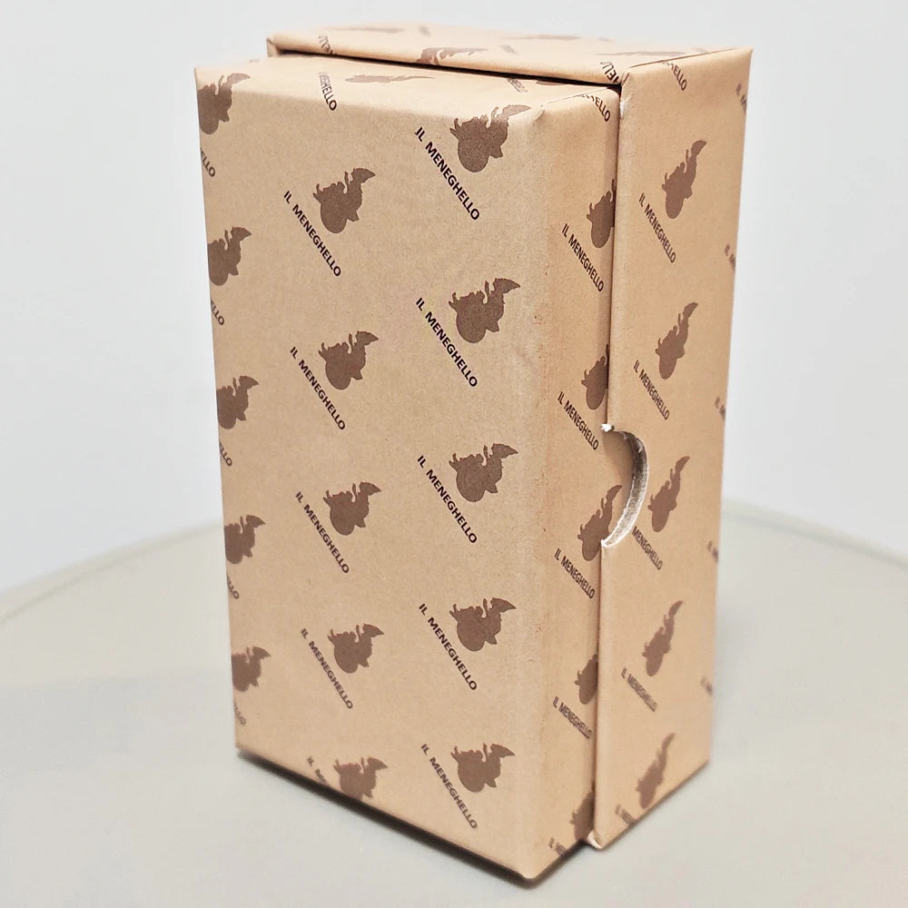 Tarocco Soprafino 1830 deck sealed in Il Meneghello ecru tissue wrapping printed with repeating brown bat motif and IL MENEGHELLO text, tied with a thin silver elastic band; shown on white surface
