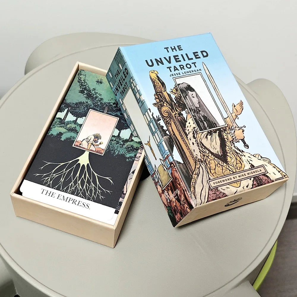 The Unveiled Tarot open rigid box showing The Empress card (rooted tree motif) beside the box lid featuring Jesse Lonergan panoramic illustration with Mike Mignola foreword credit