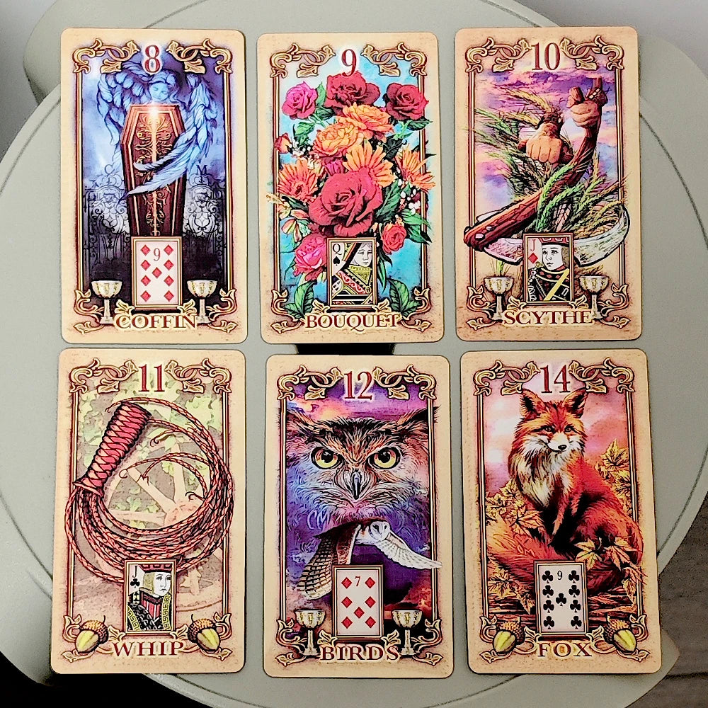 Lustrous Lenormand card 24 Heart: Cupid descending with arrow toward a bejewelled silver heart amid magenta petals on a violet sky; playing card inset Jack of Hearts; gold ornate border